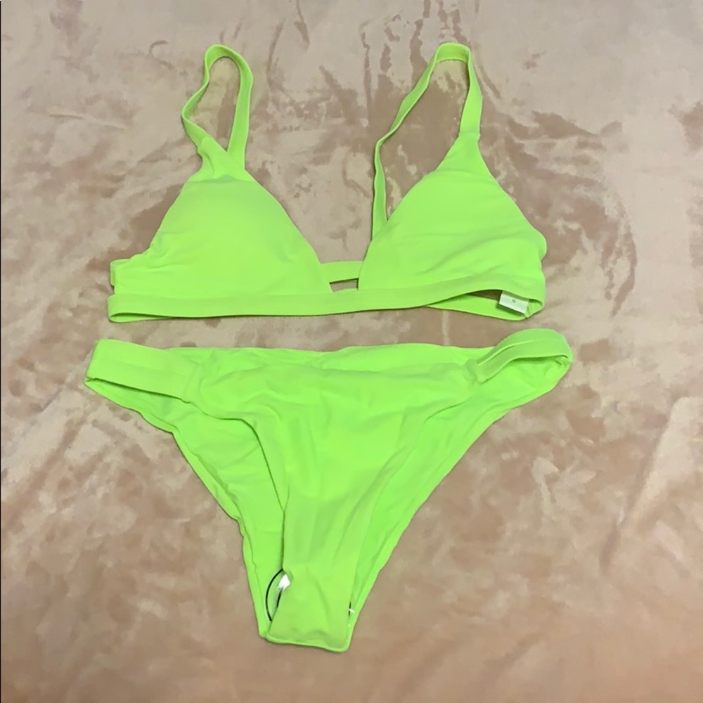 Bright yellow bikini. Never worn. NWT
